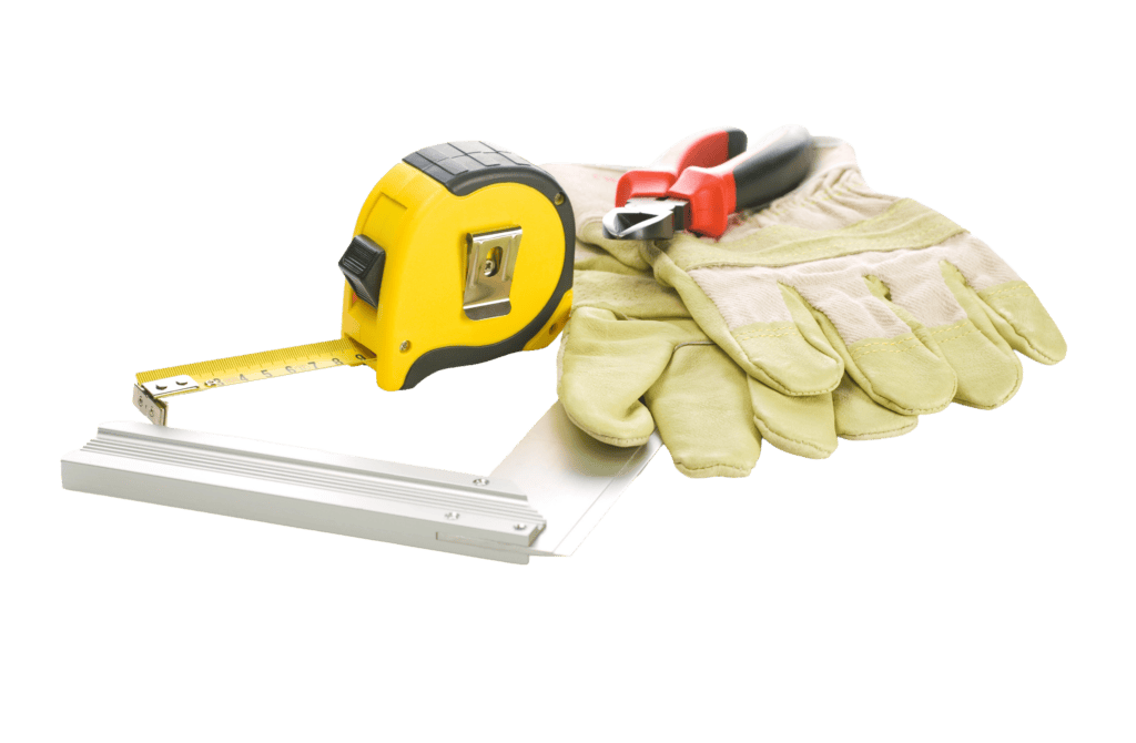 Construction tools including tape measure, gloves, and screwdriver for pool setup.